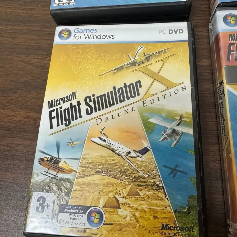 Microsoft flight simulator gold edition and deluxe edition lot of 4